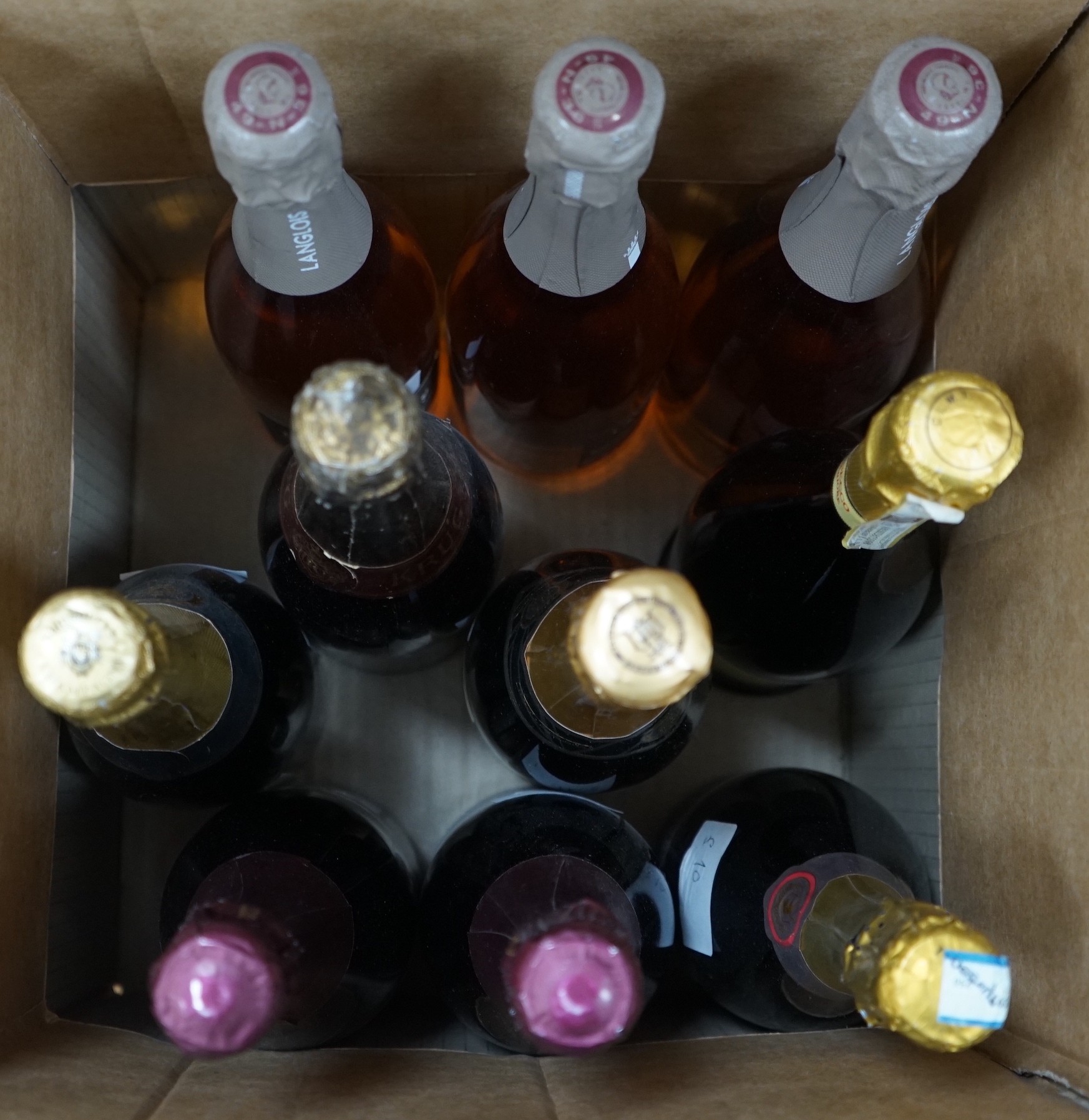 Nine bottles of champagne / sparkling wine - 3 bottles of L’extra Langlois, 2 bottles of Bleasdale sparkling Shiraz, 1 bottle of Sainsbury’s Blanc de Noirs champagne, one bottle of Balfour 1503 classic cuvee, one bottle